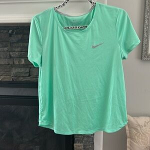 Mint green Nike top